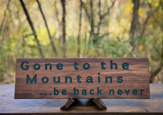 Gone to the Mountains Sign